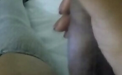 Stroking her big cock and cumming all over her hand